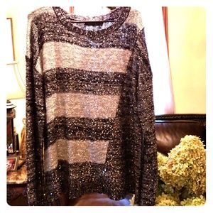 Sweater. Silver,  black and grey.